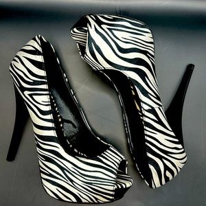 Zebra print 5.5” stilettos Size 6/7